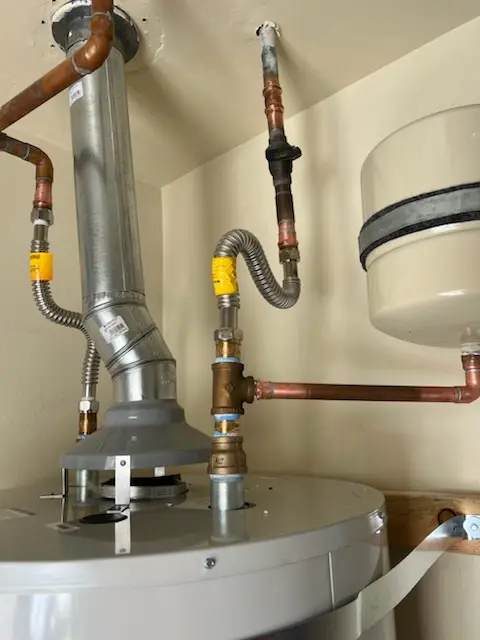 Water heater installation and plumbing repair in Rubicam